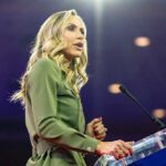 Lara Trump, speaking at a podium.