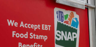 Red sign showing SNAP EBT food stamp benefits