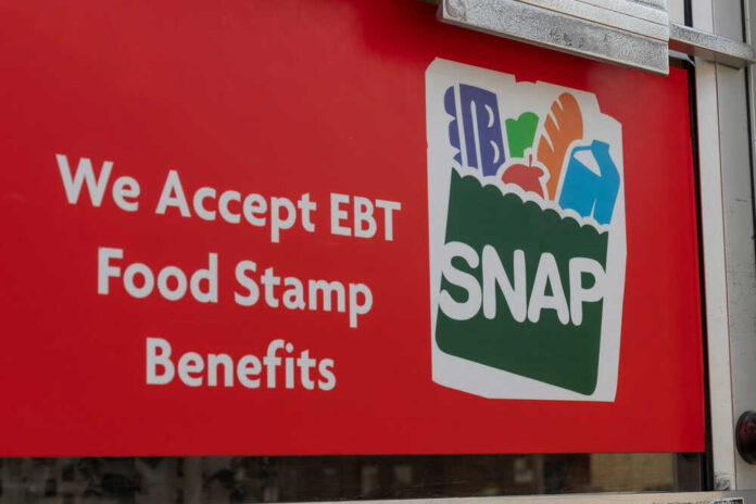 shutterstock_1757584442.jpg featured image Red sign showing SNAP EBT food stamp benefits