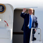 Donald Trump stepping out of Air Force One