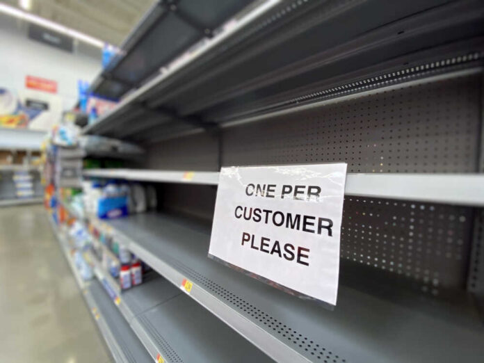 shutterstock_1672031644.jpg featured image Empty store shelf with one per customer sign