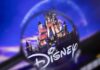 Magnifying glass focusing on Disney castle logo.