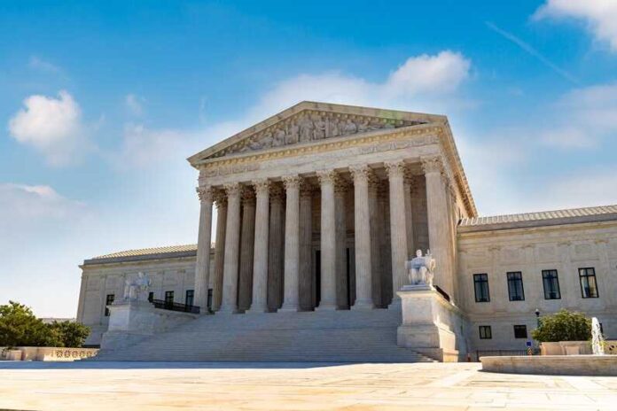shutterstock_2088295624.jpg featured image U.S. Supreme Court building exterior under blue sky.