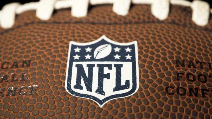 shutterstock_2268908343.jpg featured image Close-up of NFL logo on American football.
