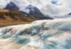 Snowy mountain landscape with glacial ice and rocks