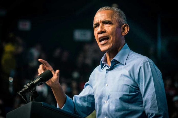 shutterstock_2230017639.jpg Barack Obama speaks at podium