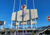 Dodger Stadium entrance with signage and clear sky