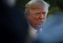 Donald Trump speaking outdoors