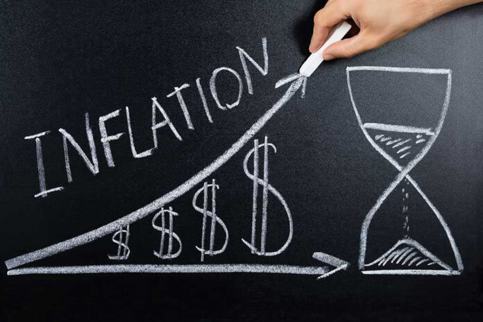 555956236 Chalkboard drawing of inflation with rising dollar symbols