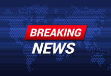 Breaking News text on world map background