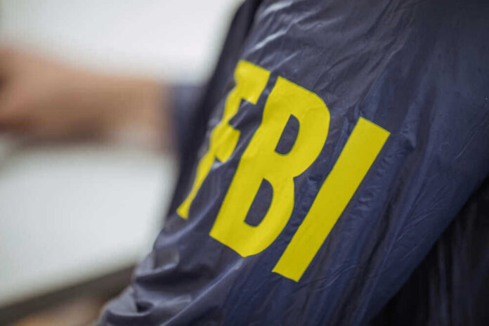Person wearing FBI jacket