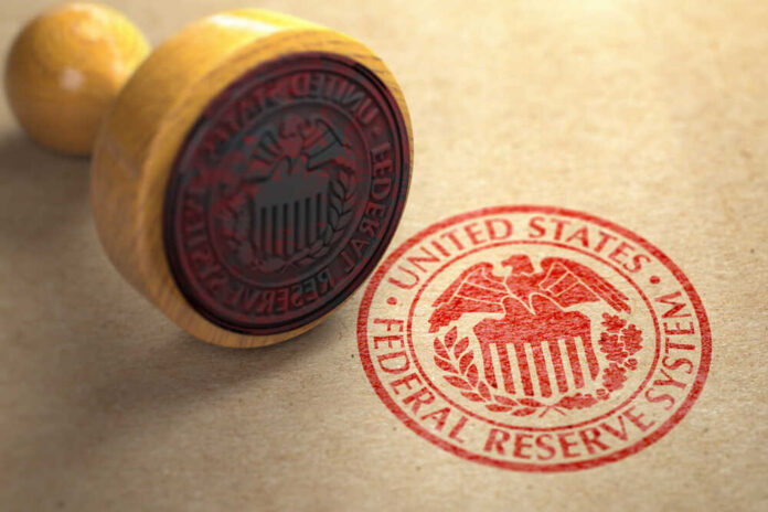 A wooden stamp with the Federal Reserve seal on a brown paper background