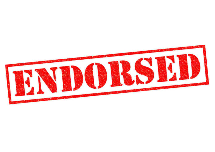 Red endorsed stamp text on white background