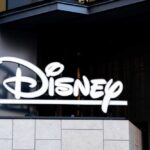 Disney logo displayed on a modern building
