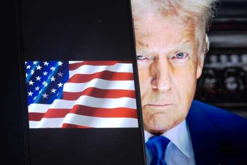 shutterstock_2572801869.jpg Close-up of a political figure with an American flag in the background