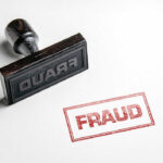 Fraud stamp and red stamped imprint on paper
