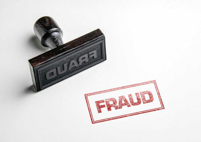 Fraud stamp and red stamped imprint on paper