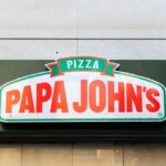 Sign of Papa John's pizza restaurant