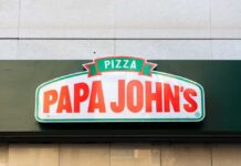 Sign of Papa John's pizza restaurant