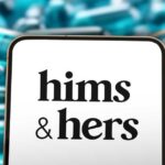 Smartphone displaying the 'hims & hers' logo with pills in the background