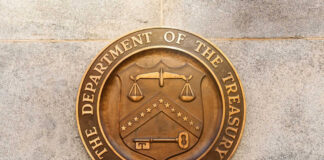 Department of the Treasury seal on stone wall
