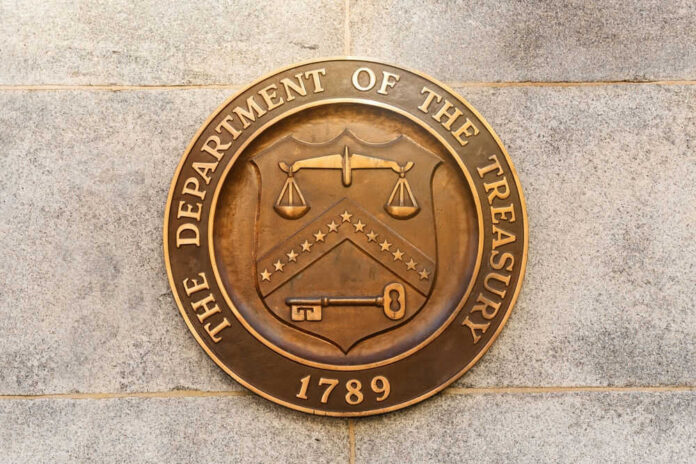 Department of the Treasury seal on stone wall