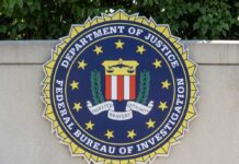 FBI seal featuring stars and laurel leaves