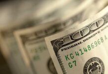 Close-up of a stack of hundred dollar bills