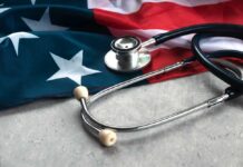 A stethoscope resting on an American flag