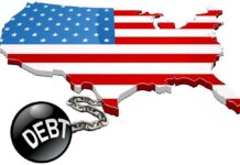 Map of the USA with an American flag design and a ball and chain labeled 'DEBT'
