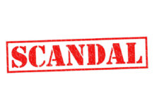 Red stamp with the word scandal