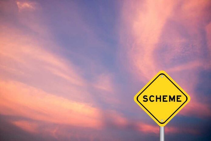 Yellow,Transportation,Sign,With,Word,Scheme,On,Violet,Color,Sky A yellow warning sign with the word 'SCHEME' against a colorful sky