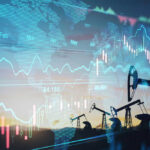 Oil pumps and financial charts against world map