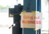 Sign stating 'Going out of Business' attached to a pole