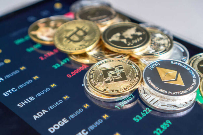 Cryptocurrency coins on digital trading screen