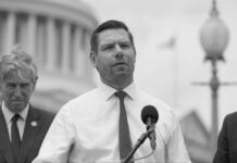 Eric Swalwell in a podium speaking