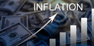 A visual representation of inflation with dollar bills and a rising graph