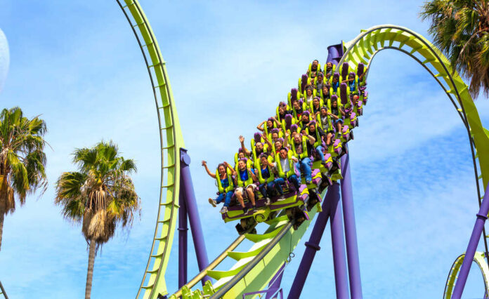 Vallejo,,California,,Usa,June,14th,,2016:,Roller,Coaster,Medusa,Is Roller coaster riders on a green and purple loop