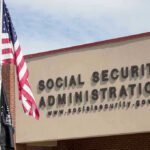 Social Security Administration building with American flag outside.