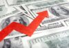 A red arrow indicating growth over scattered hundred dollar bills