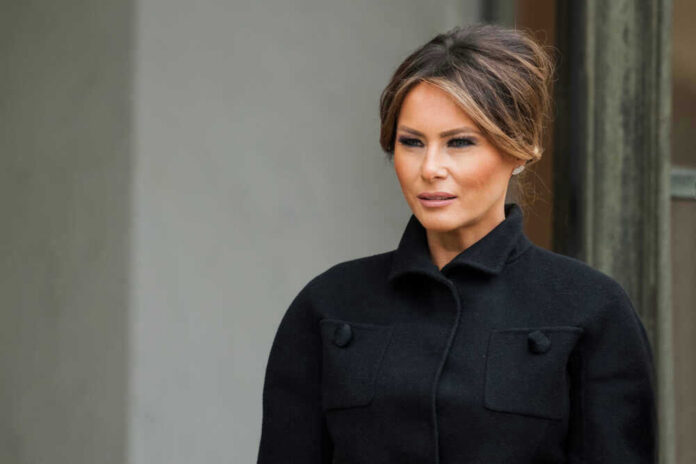 shutterstock_1232034112 Melania Trump in black coat.