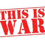A bold red stamp with the text 'THIS IS WAR'
