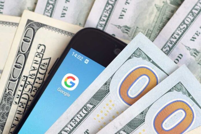 Kharkov,,Ukraine,-,February,6,,2020:,Smartphone,Screen,With,Google Smartphone with Google app on screen among US dollar bills