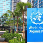 World Health Organization sign outside modern building