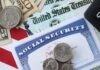 A collection of financial documents including a Social Security card, cash, and coins