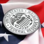 Federal Reserve System emblem on an American flag