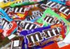 M&M's candy bags in assorted flavors spread out
