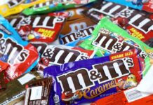 M&M's candy bags in assorted flavors spread out