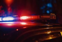 Close-up of a police car's emergency lights at night