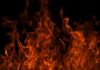 Close-up of vibrant flames against a black background